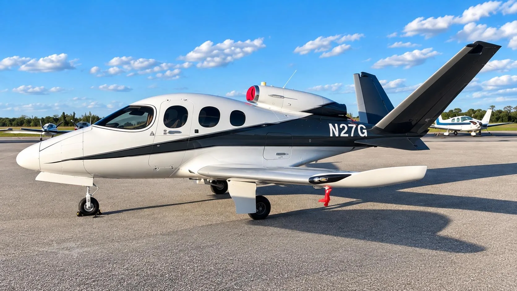 Exterior view of a 2022 CIRRUS VISION SF50-G2+, N27G.