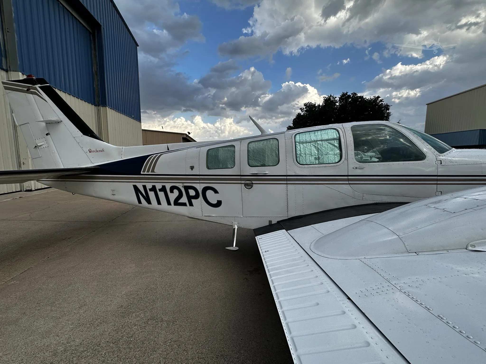 Exterior view of a 1976 BEECHCRAFT 58 BARON, N112PC.
