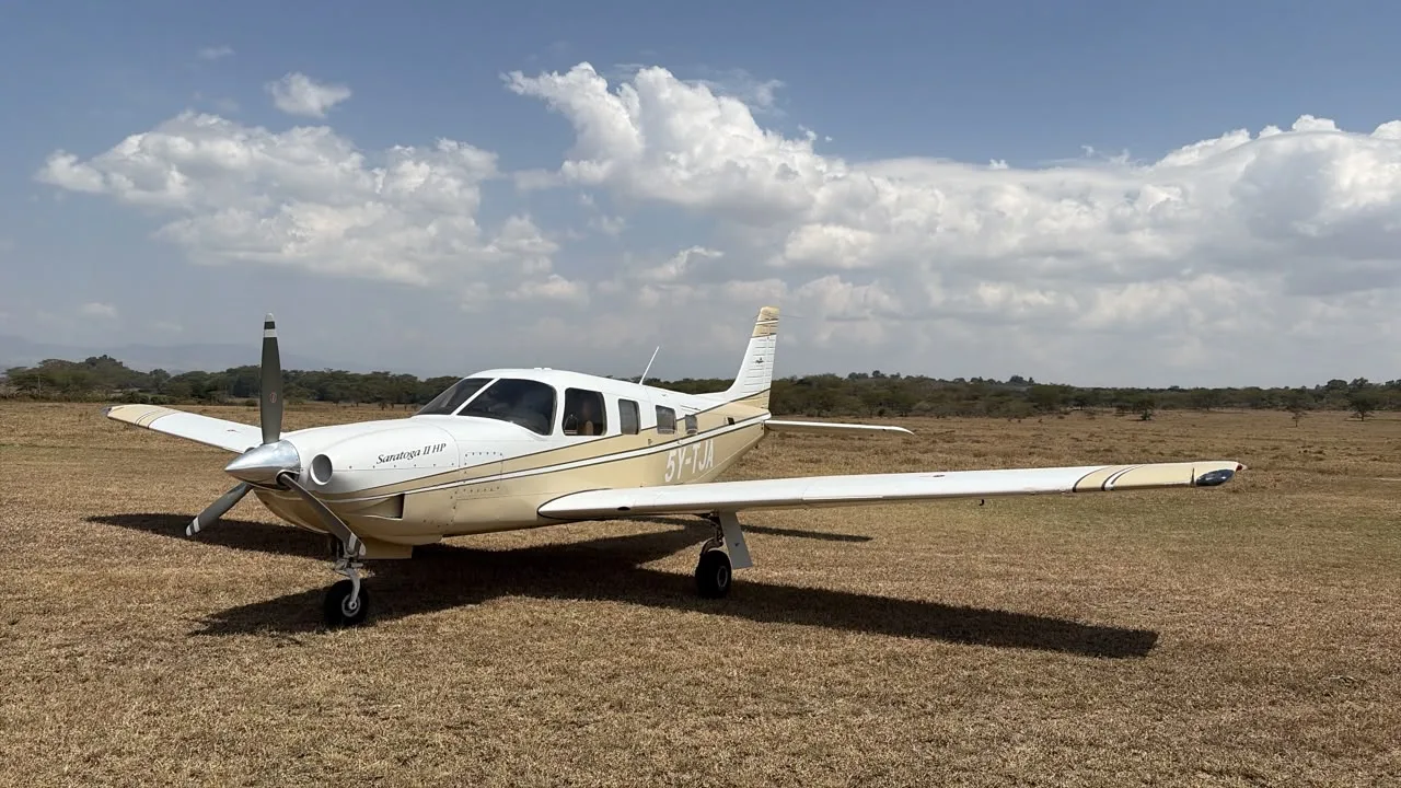 Exterior view of a 1999 Piper Saratoga, 5Y-TJA.