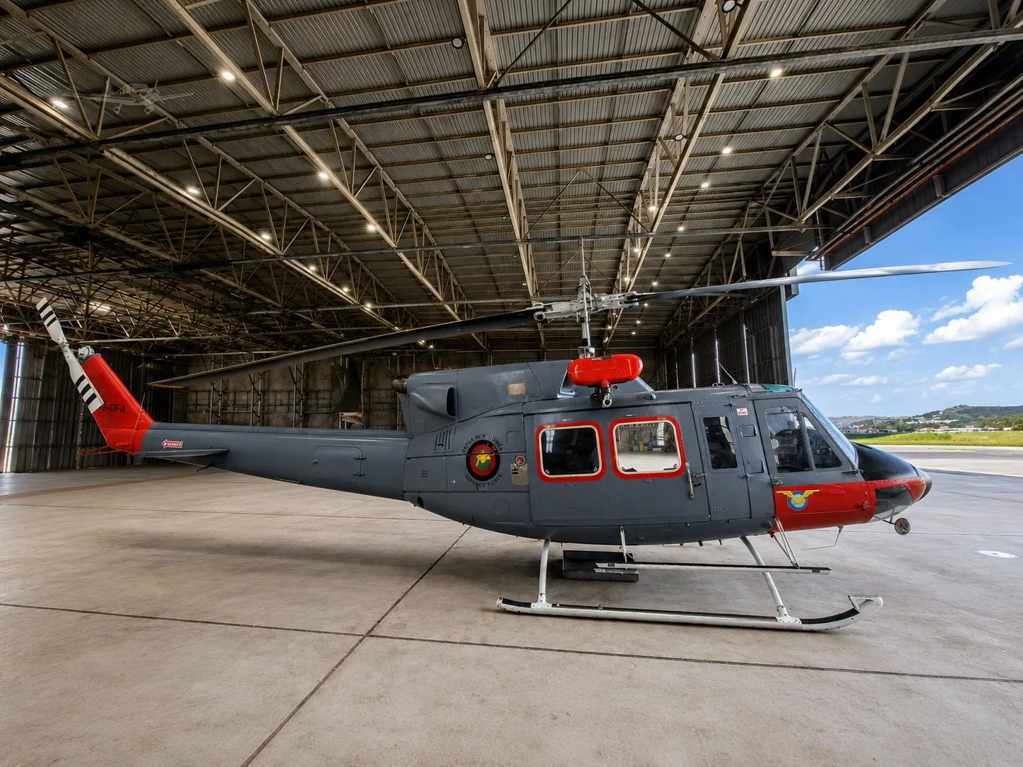 Exterior view of a 1970 BELL 212, P2-DFA.