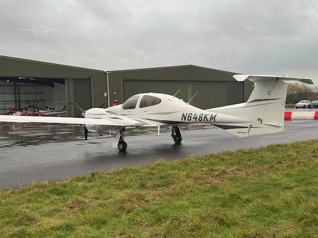 Exterior view of a 2008 DIAMOND DA42 TDI, N618KM.