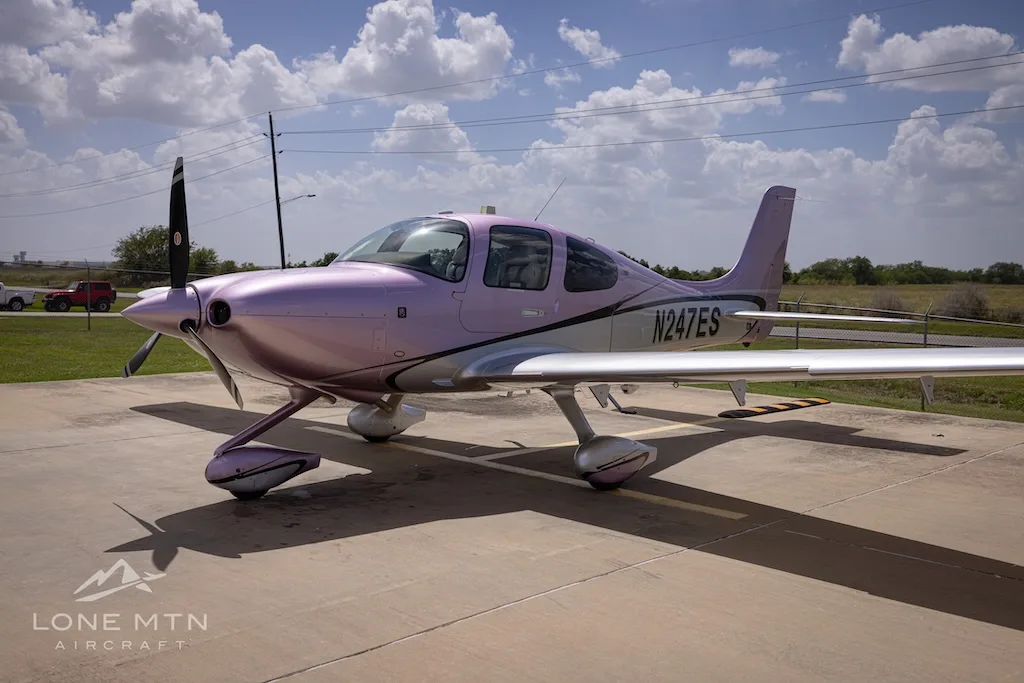 Exterior view of a 2024 Cirrus SR22 G7 GTS, N247ES.