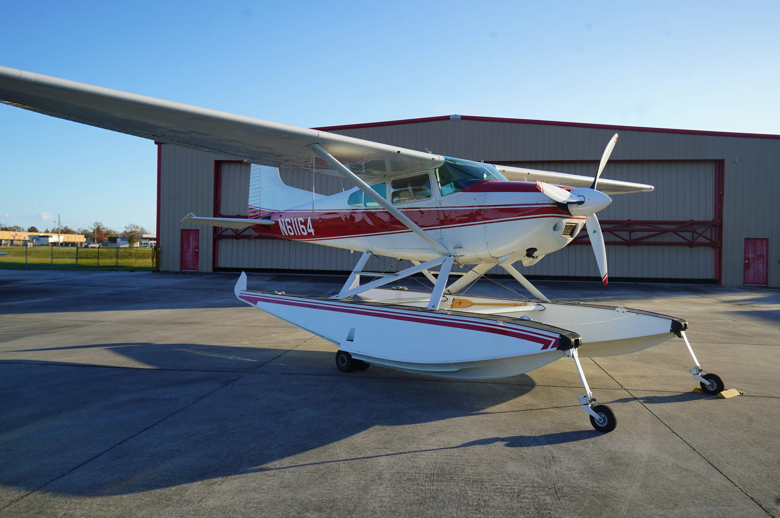 Exterior view of a 1980 Cessna A185F Amphibian, N61164.