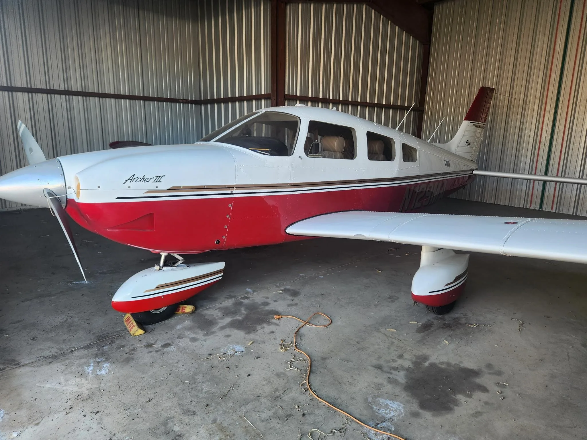Exterior view of a 1995 PIPER ARCHER III, N129MA.