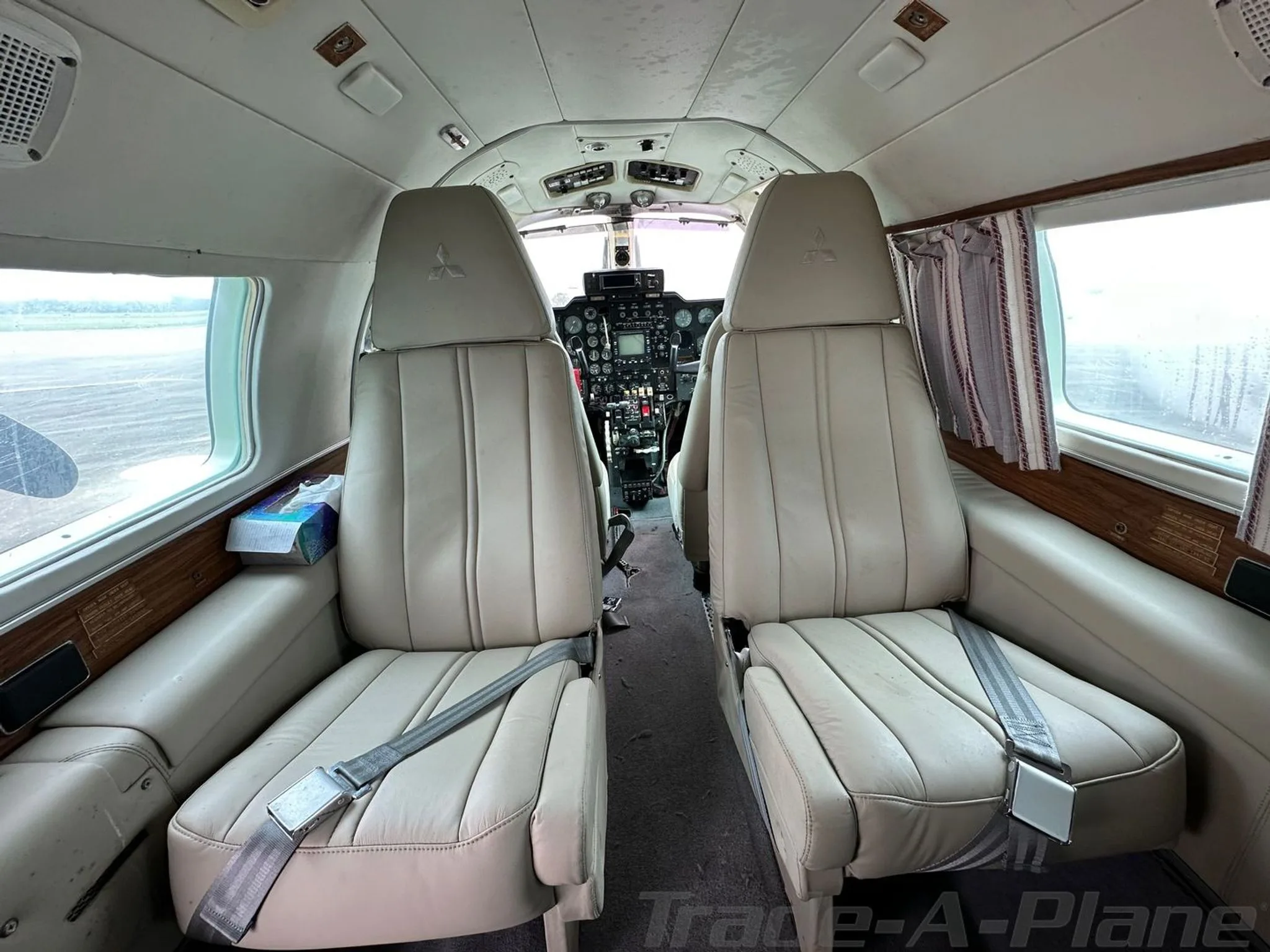 Cabin interior of a 1976 MITSUBISHI MU 2M.