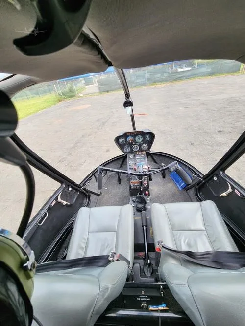 Cockpit and instrument panel of a 2001 ROBINSON R44 RAVEN I.