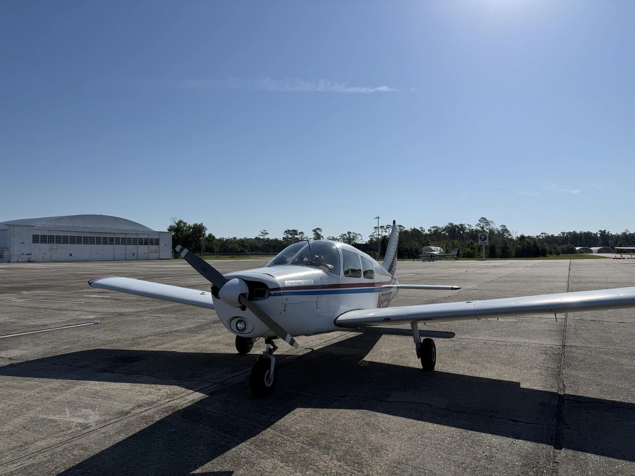 Exterior view of a 1976 PIPER CHEROKEE 140, N833WT.