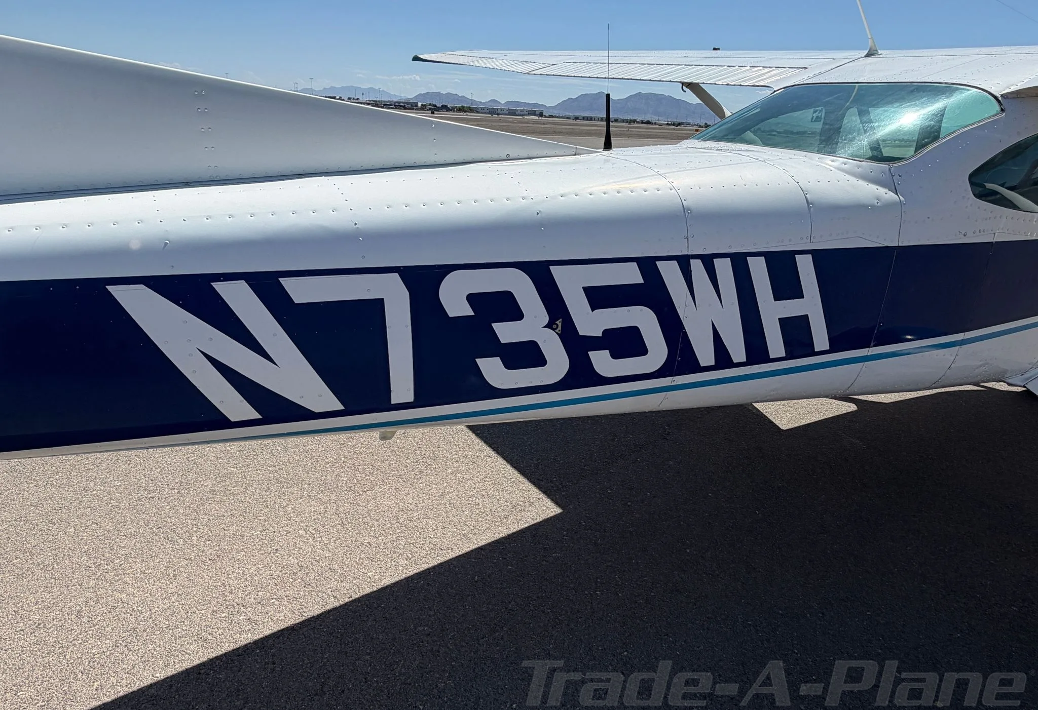 Exterior view of a 1978 CESSNA 182Q SKYLANE, N735WH.