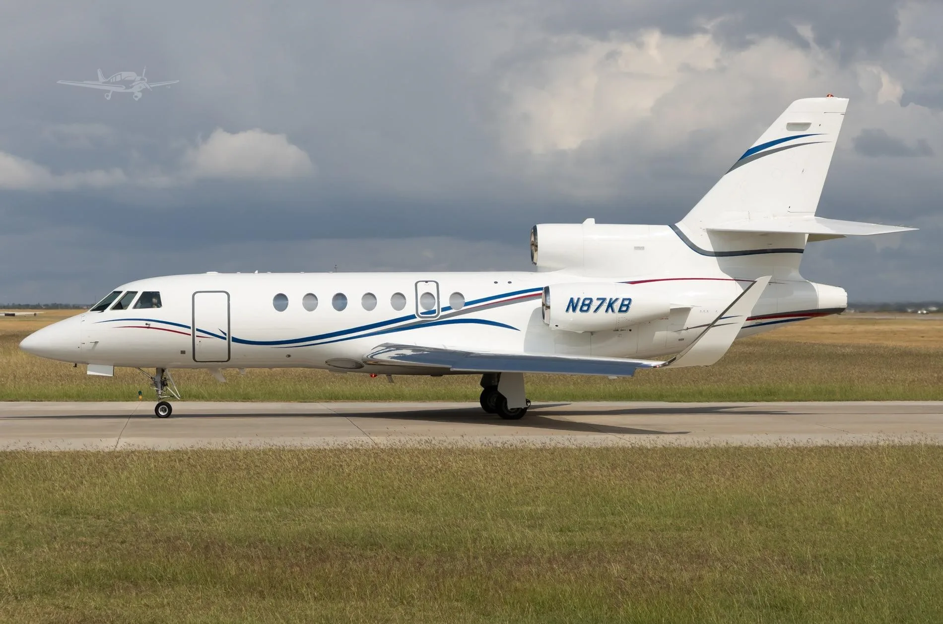Exterior view of a 2003 DASSAULT FALCON 50EX, N87KB.
