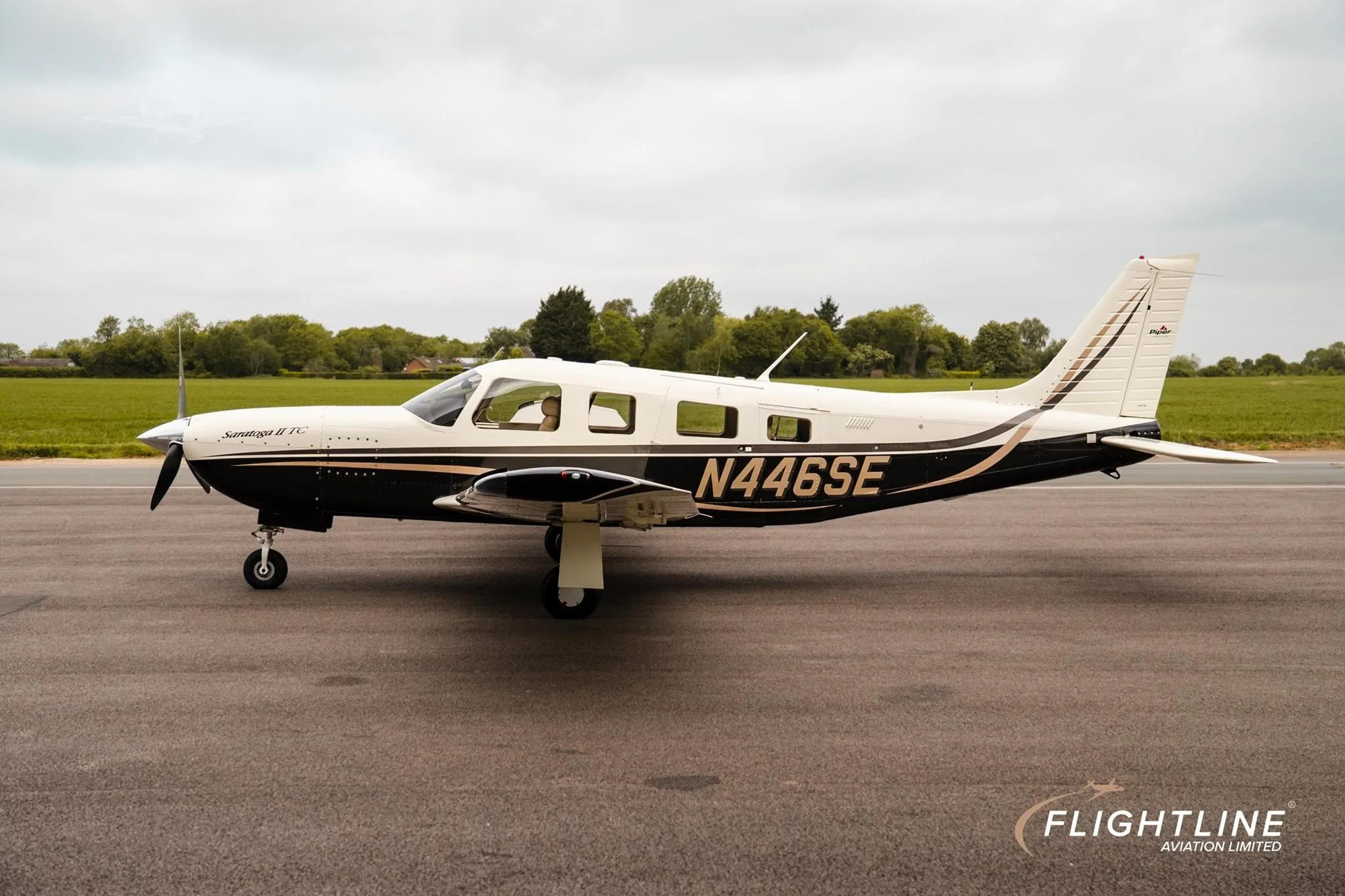 Exterior view of a 2007 PIPER SARATOGA II TC, N446SE.