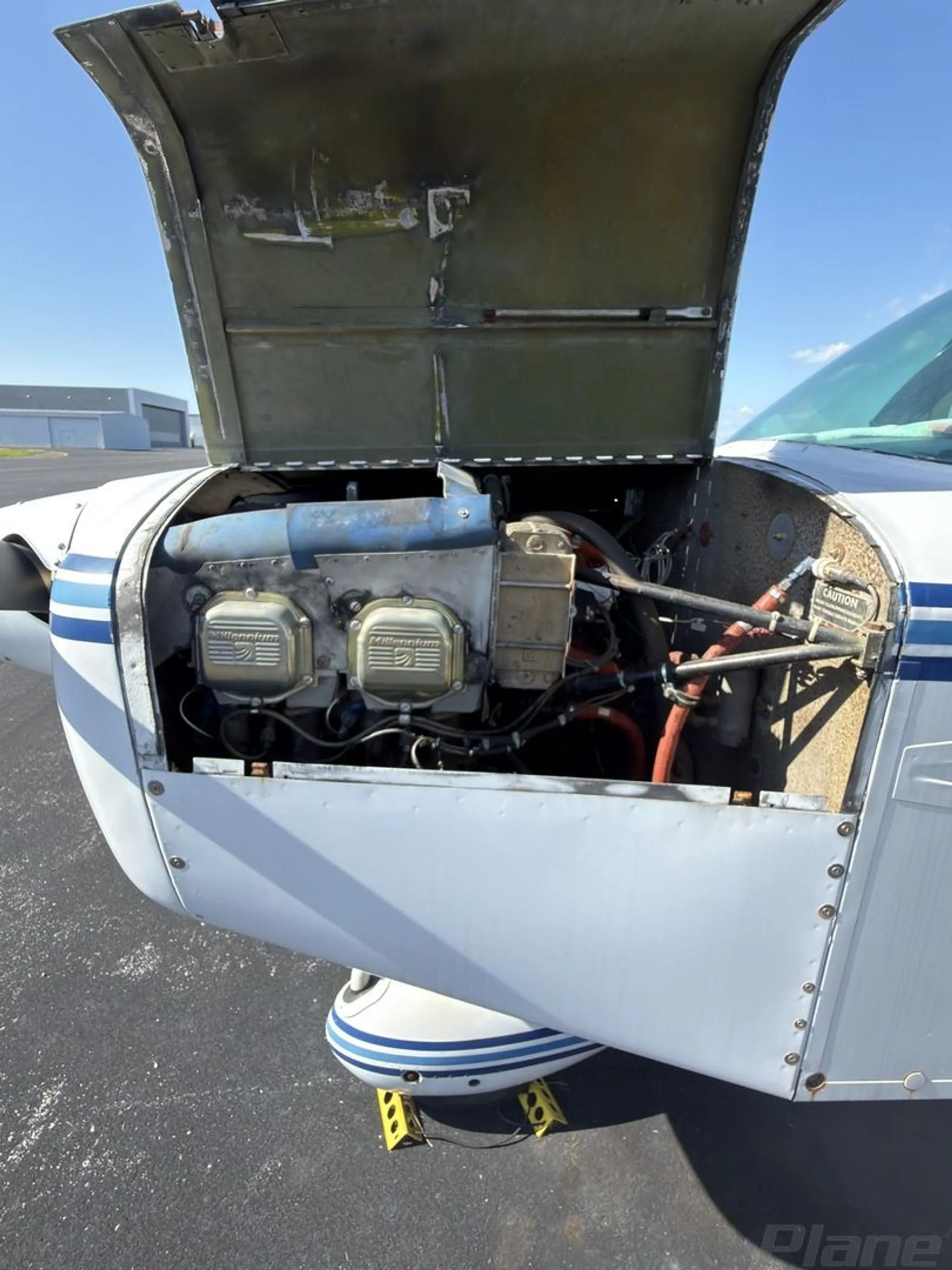 Engine detail of a 1974 GRUMMAN/AMERICAN GENERAL AA5 TRAVELER.