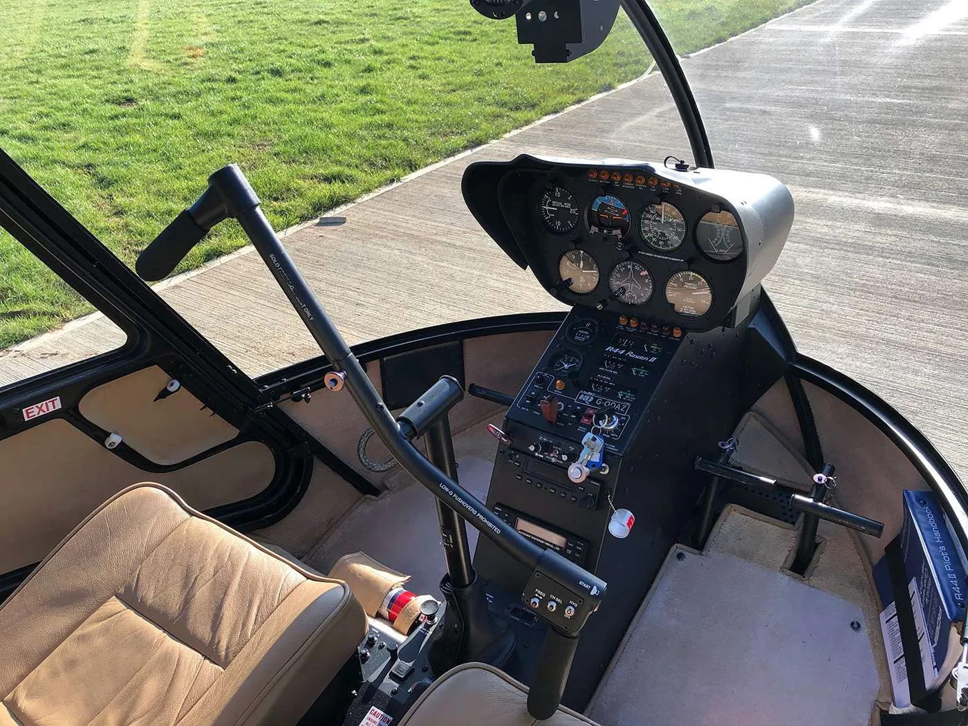 Cockpit and instrument panel of a 2008 Robinson R44 Raven II.
