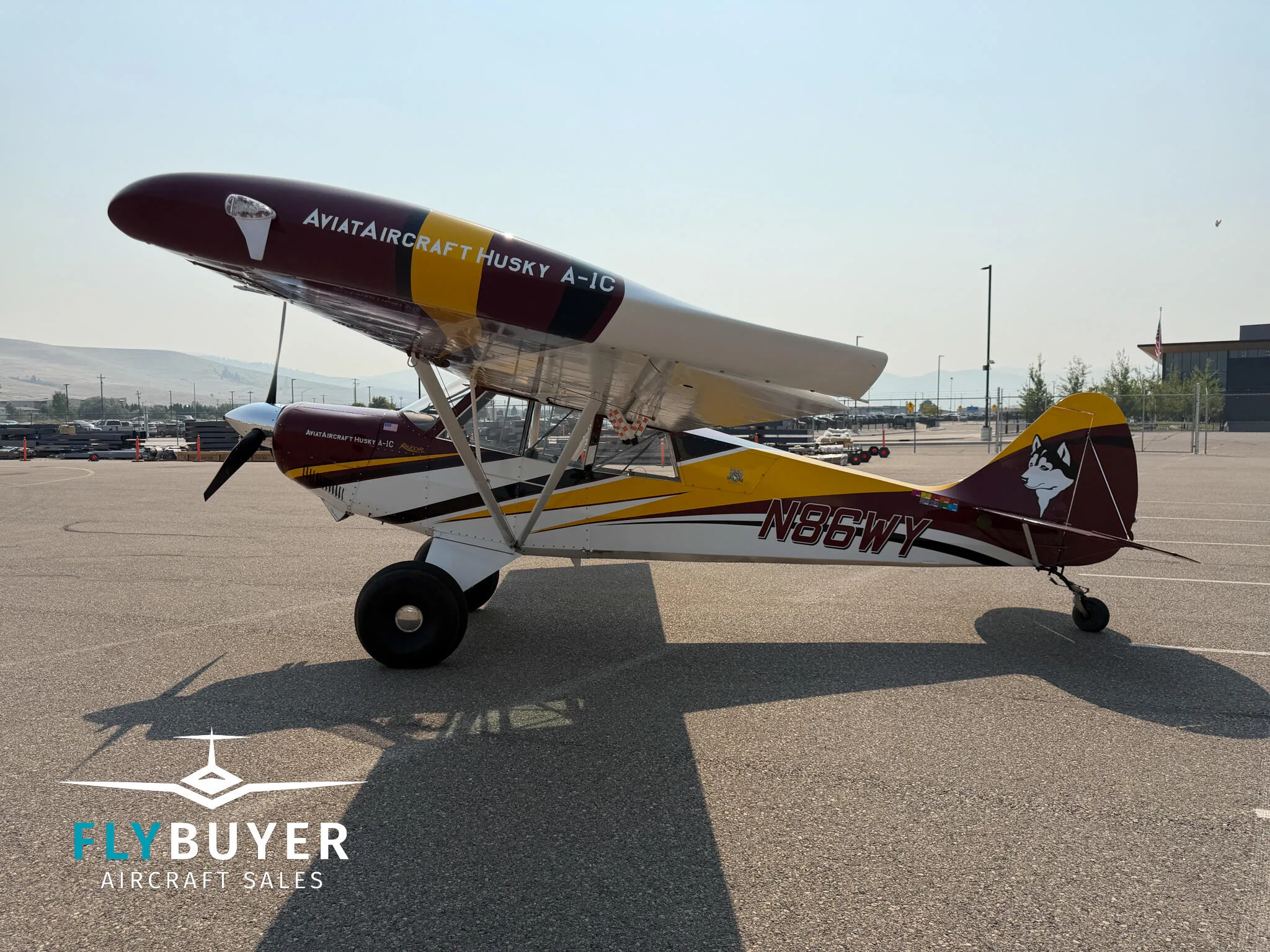 Exterior view of a 2012 Aviat A-1C-200 Husky.