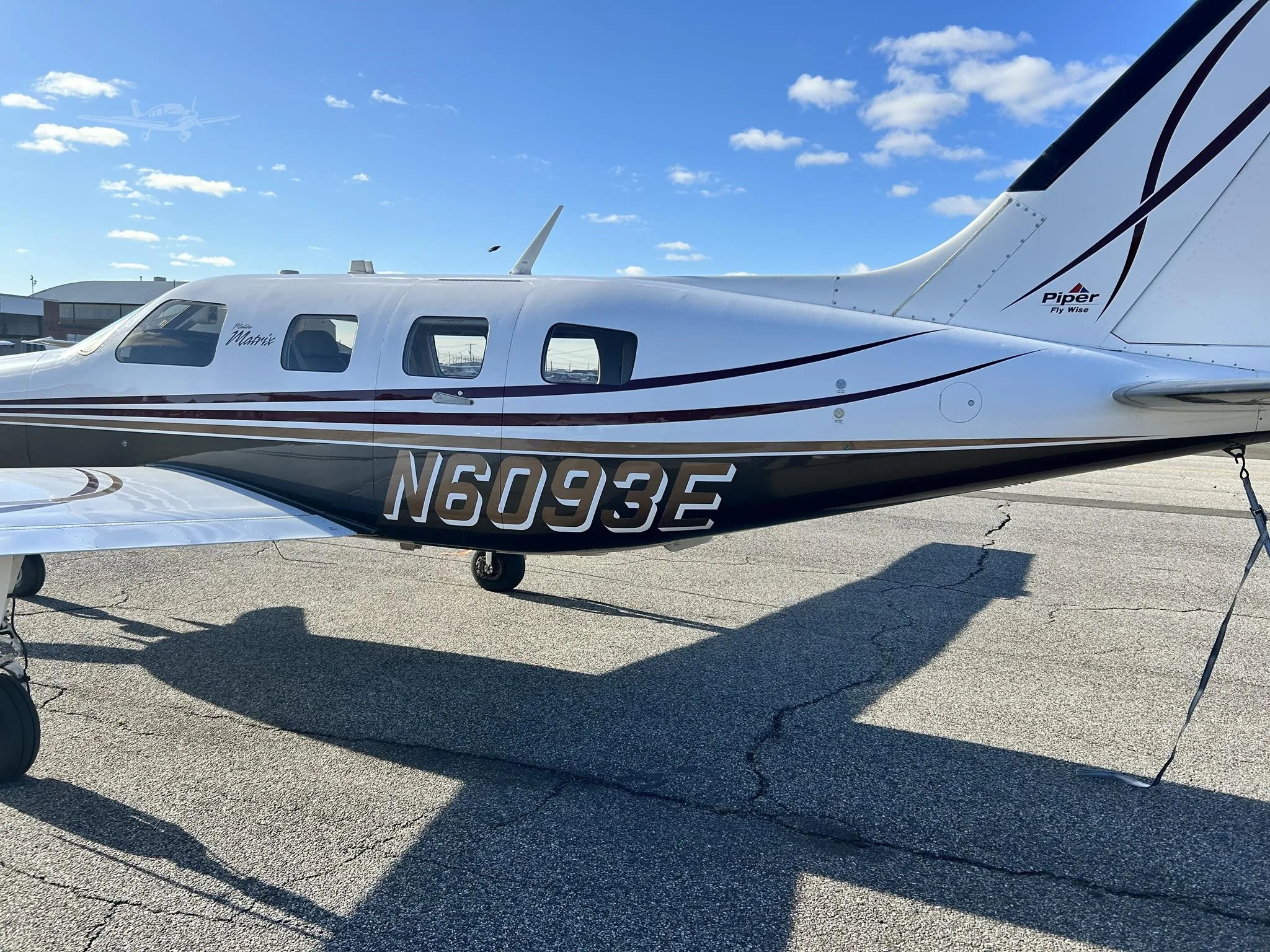 Exterior view of a 2010 PIPER MALIBU MATRIX, N6093E.