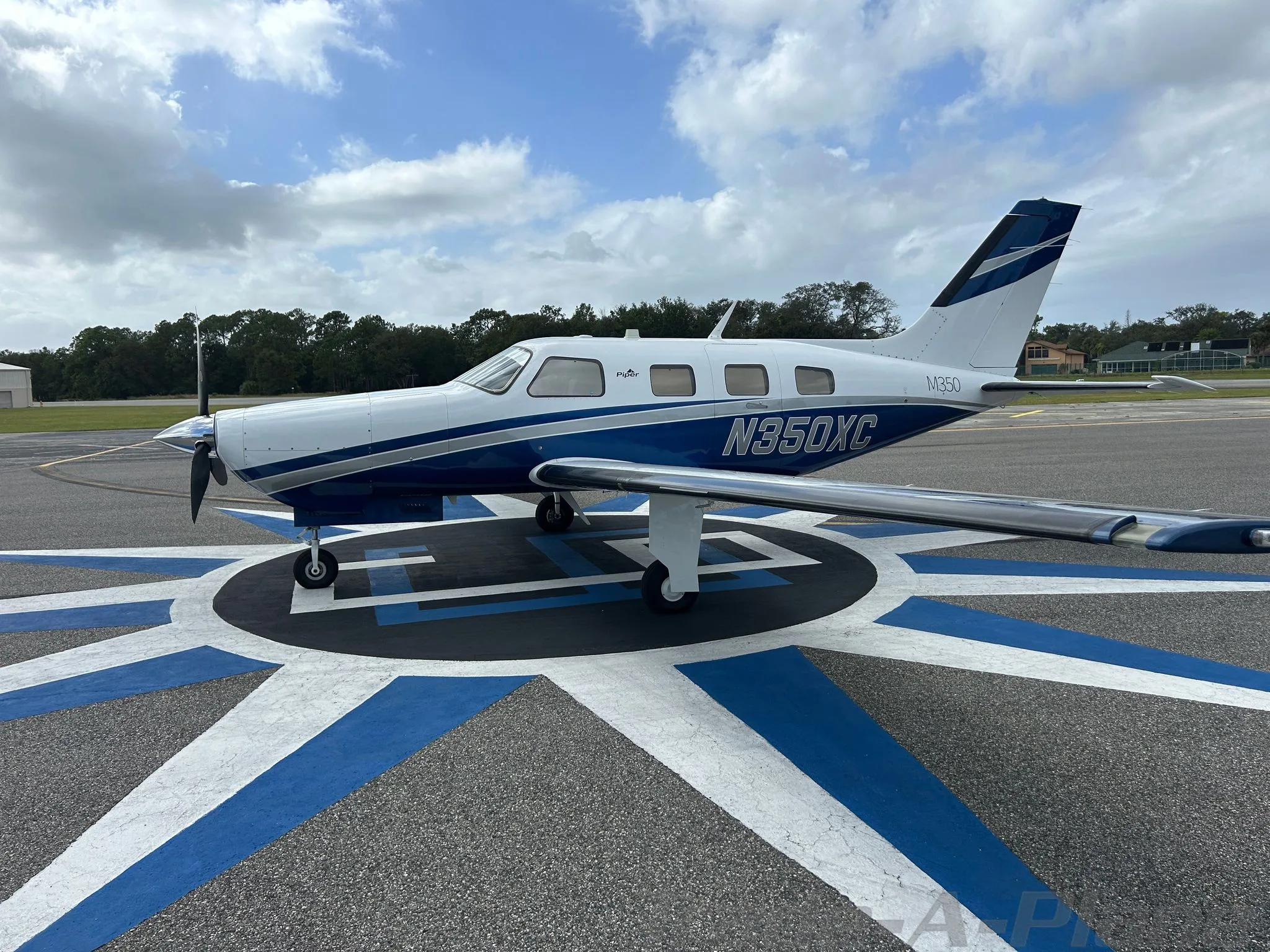 Exterior view of a 2017 PIPER M350, N350XC.