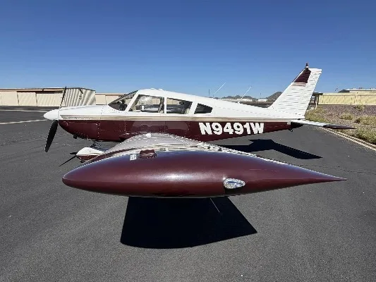Exterior view of a 1969 Piper Cherokee 235, N9491W.