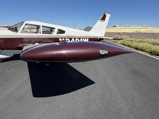 Exterior view of a 1969 Piper Cherokee 235, N9491W.