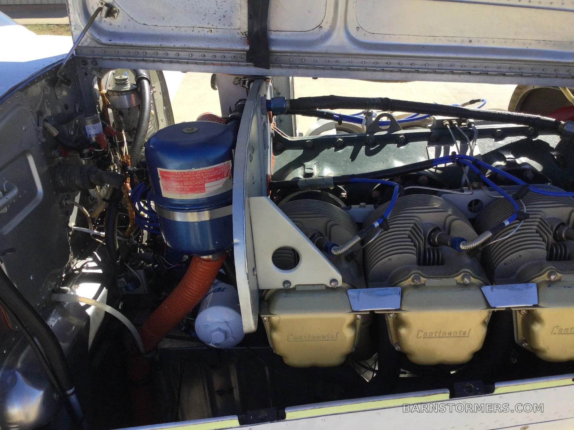 Engine detail of a 1956 Beechcraft BONANZA.