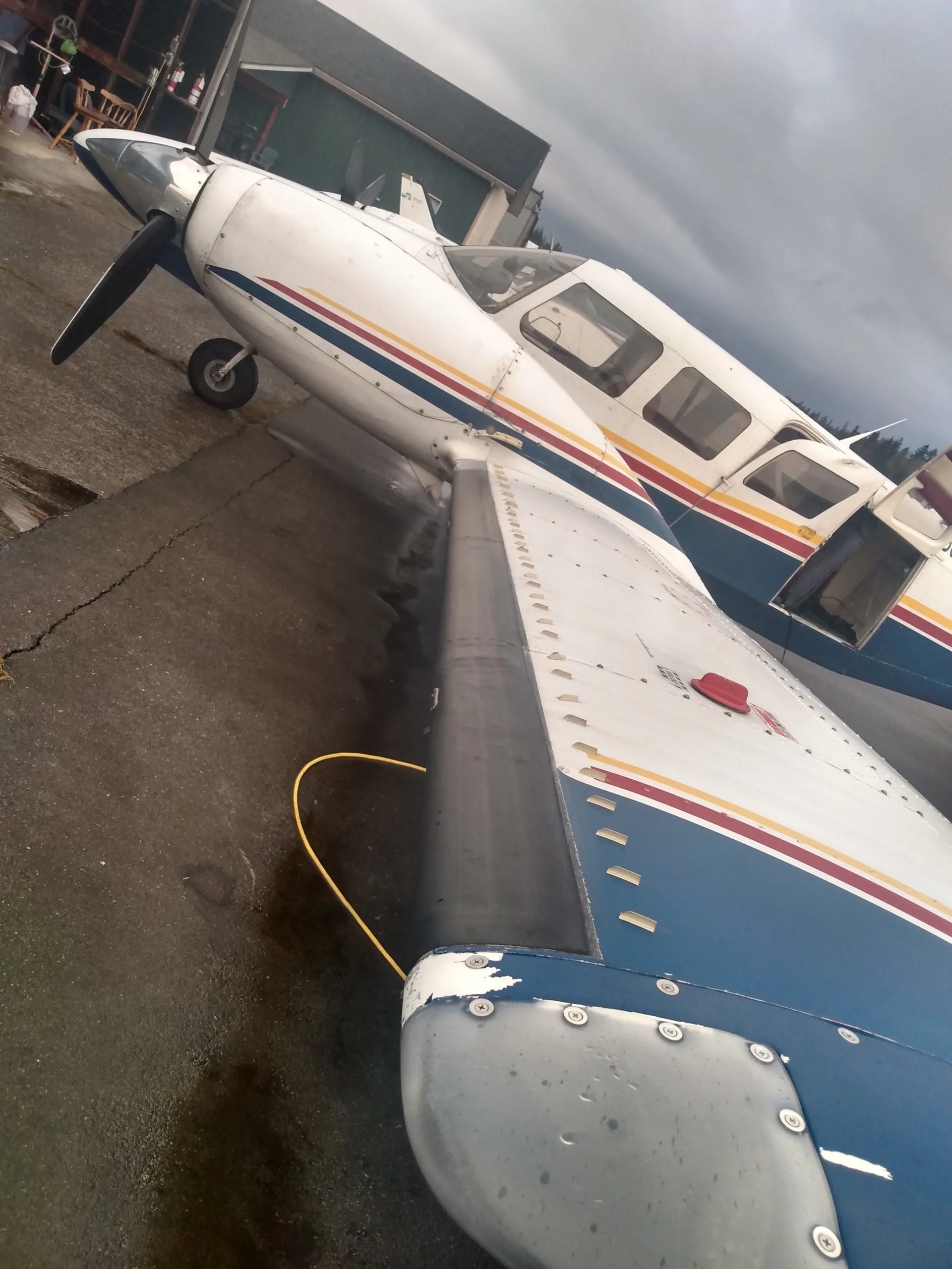 Exterior view of a Piper aircraft operating certificate with a seneca i ii.