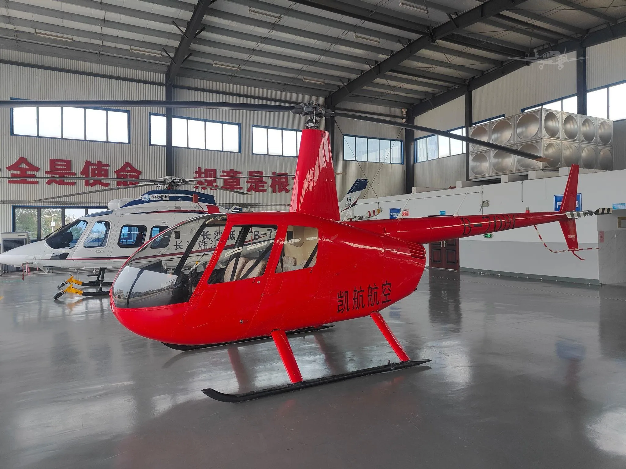 Exterior view of a 2015 ROBINSON R44 RAVEN II, B-70HC.