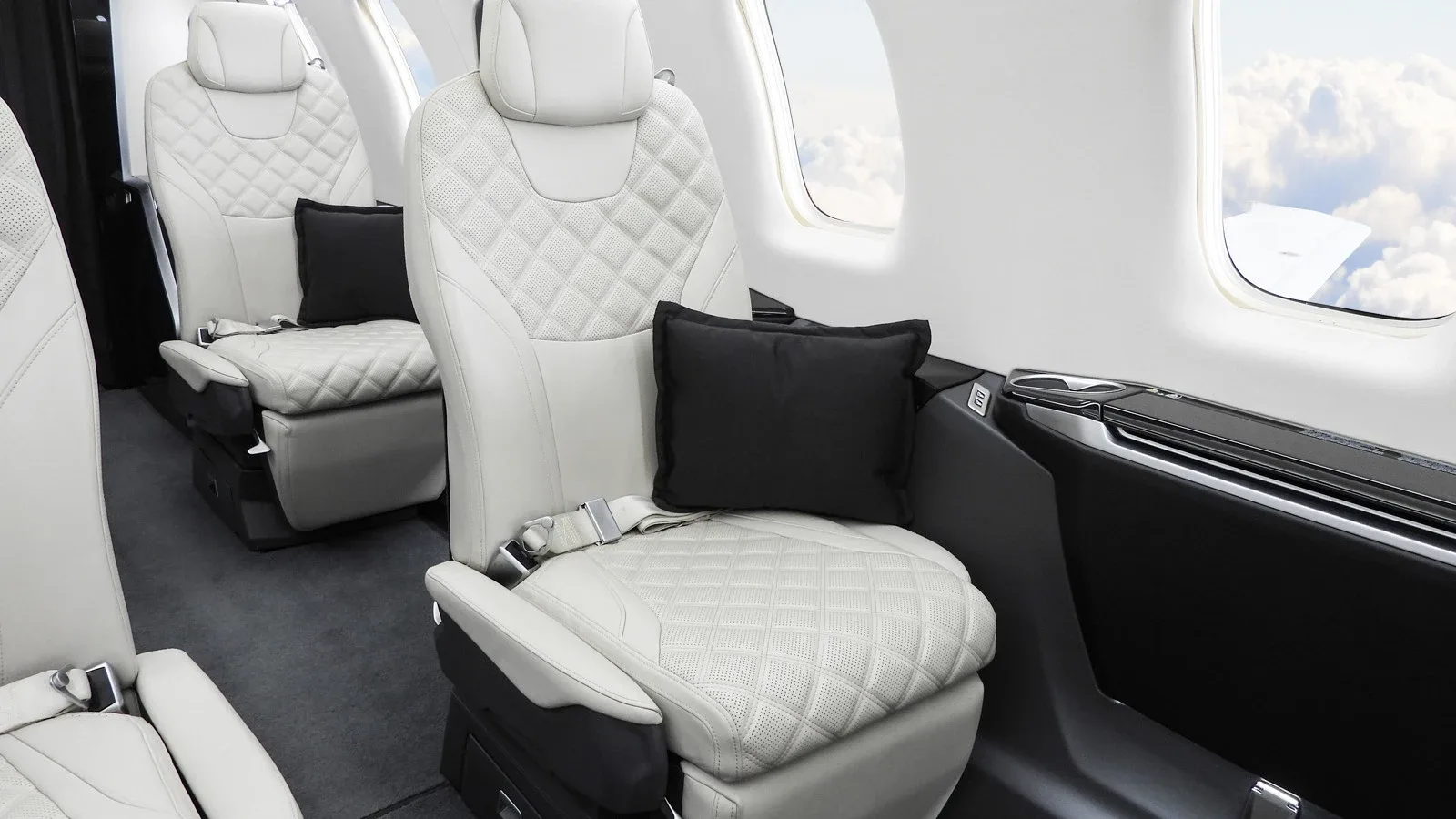 Cabin interior of a Pilatus Jet.
