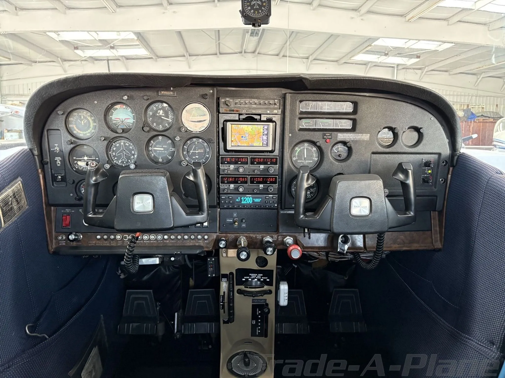Cockpit and instrument panel of a 1975 CESSNA 182P SKYLANE.