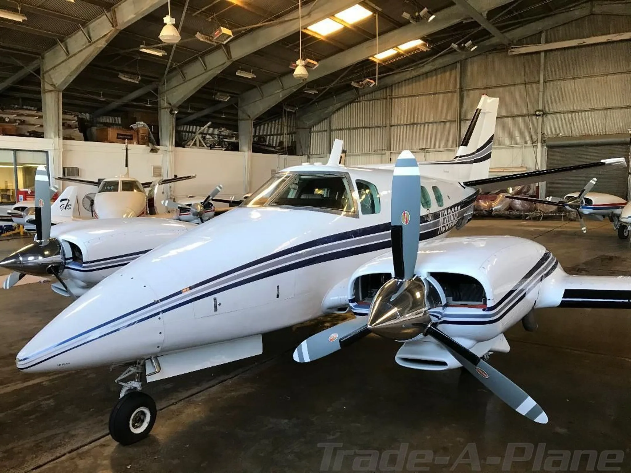Exterior view of a 1972 BEECHCRAFT B60 DUKE, N306QC.