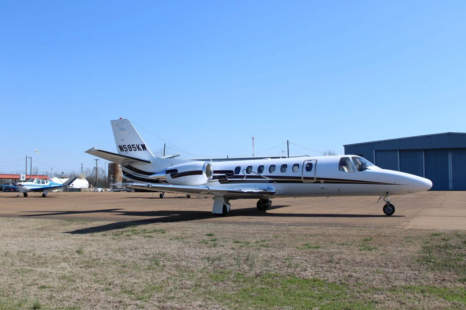 Exterior view of a 2002 CESSNA CITATION ENCORE, N595KW.