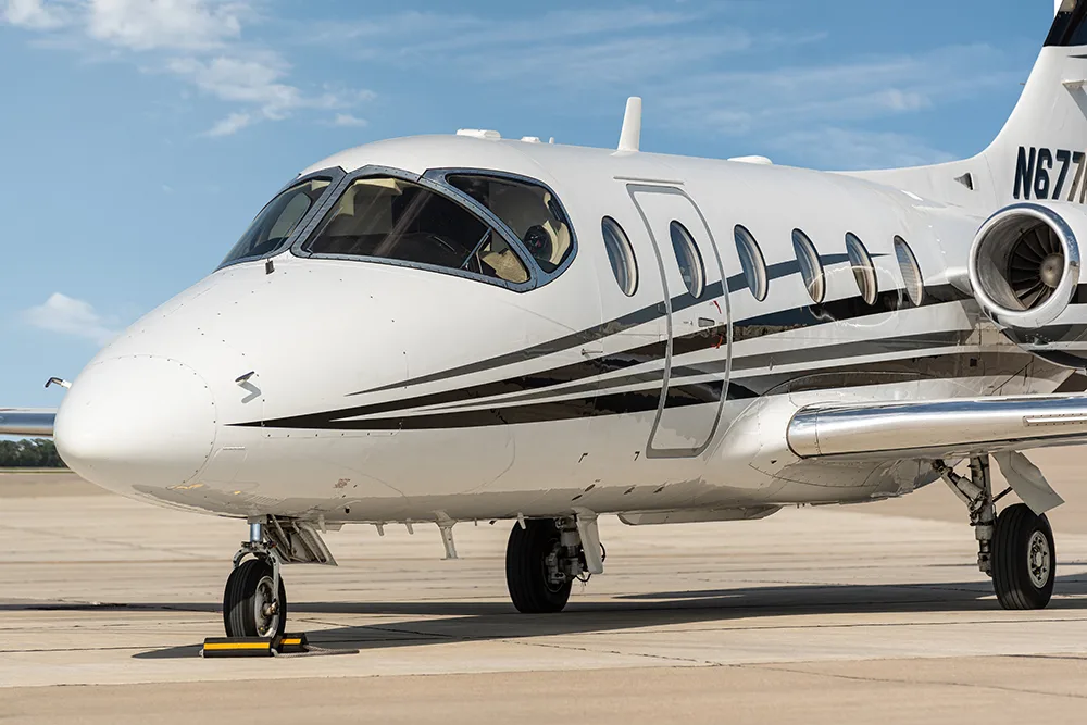 Exterior view of a 1997 Beechcraft Beechjet 400A, N677KE.