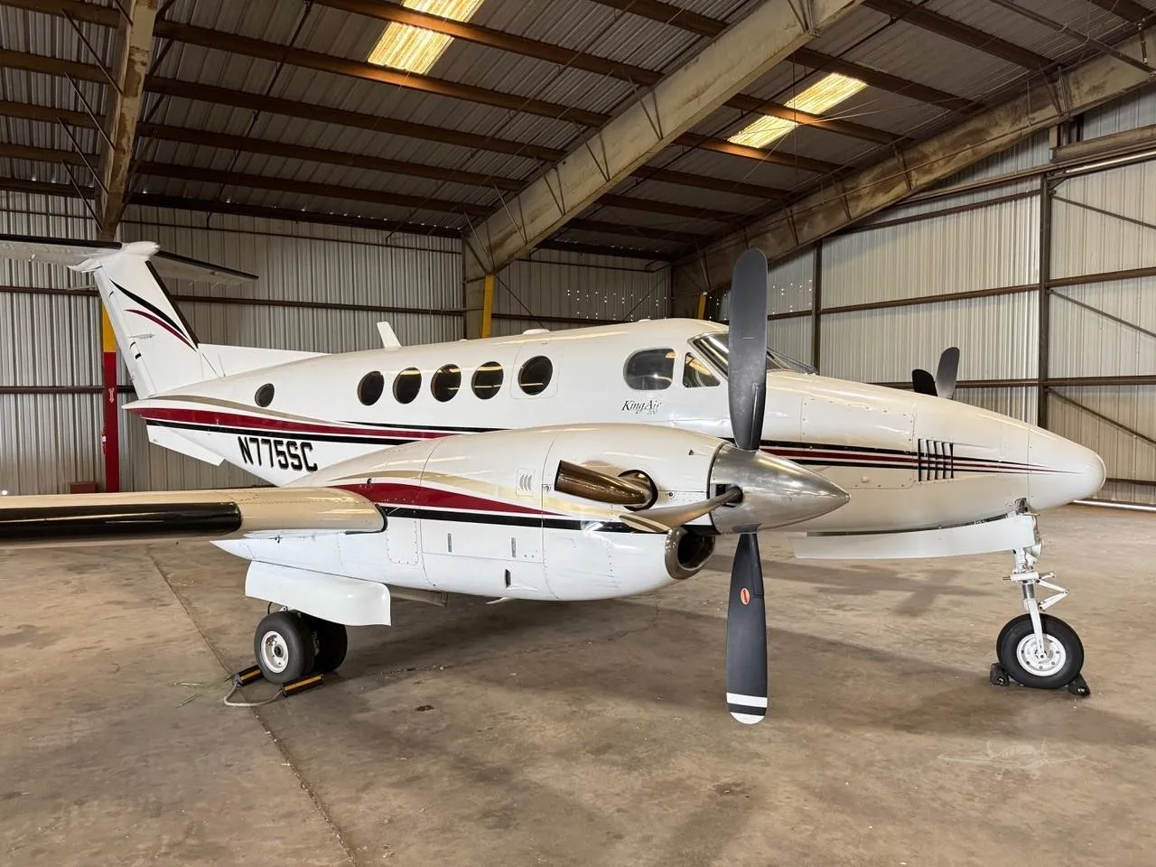 Exterior view of a 1980 BEECHCRAFT KING AIR 200, N775SC.
