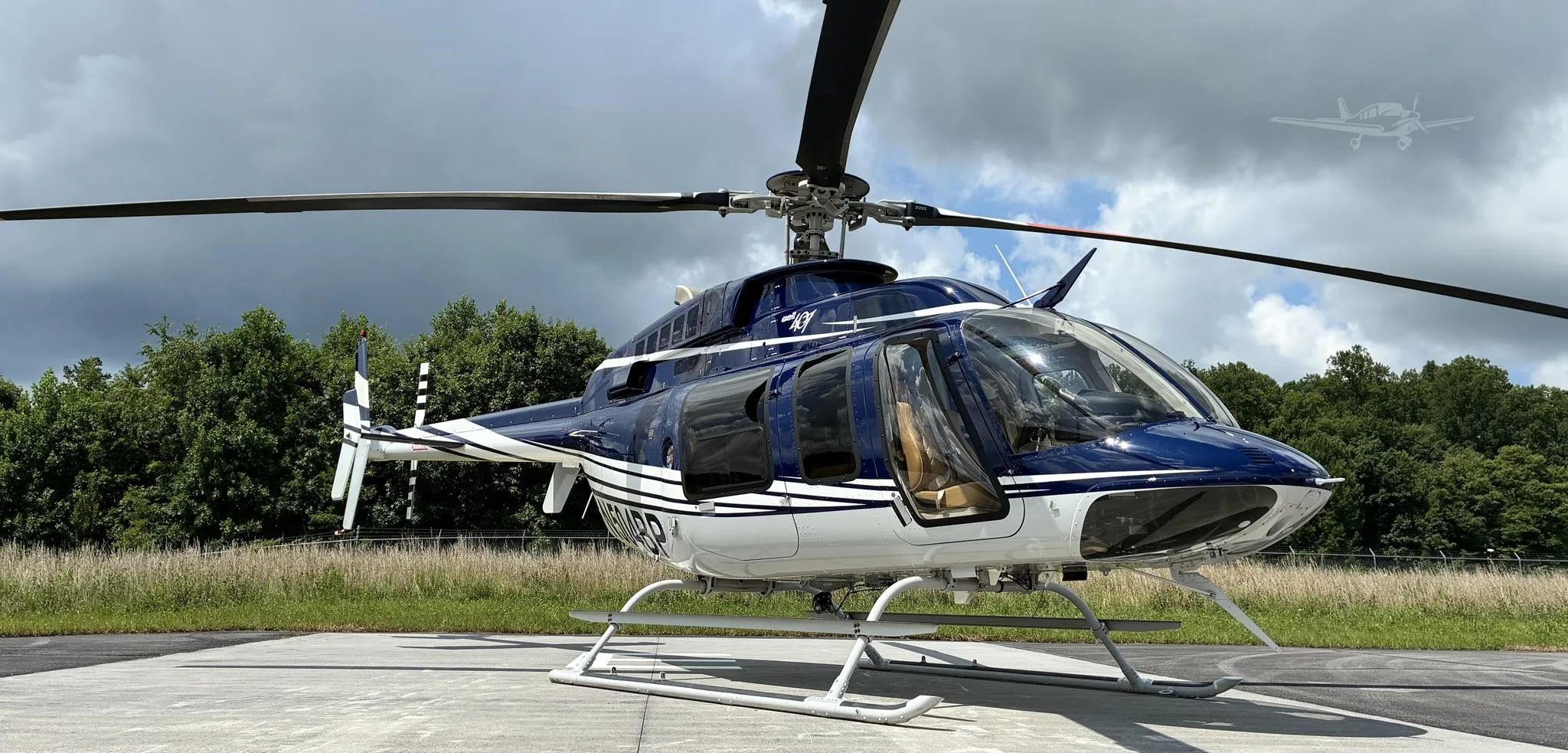 Exterior view of a 2004 BELL 407, N504BP.