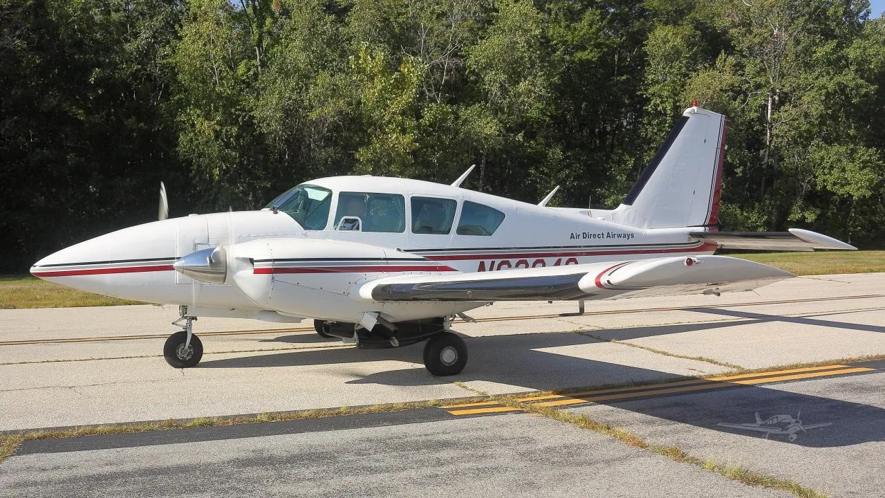 Exterior view of a 1977 PIPER AZTEC F, N62840.