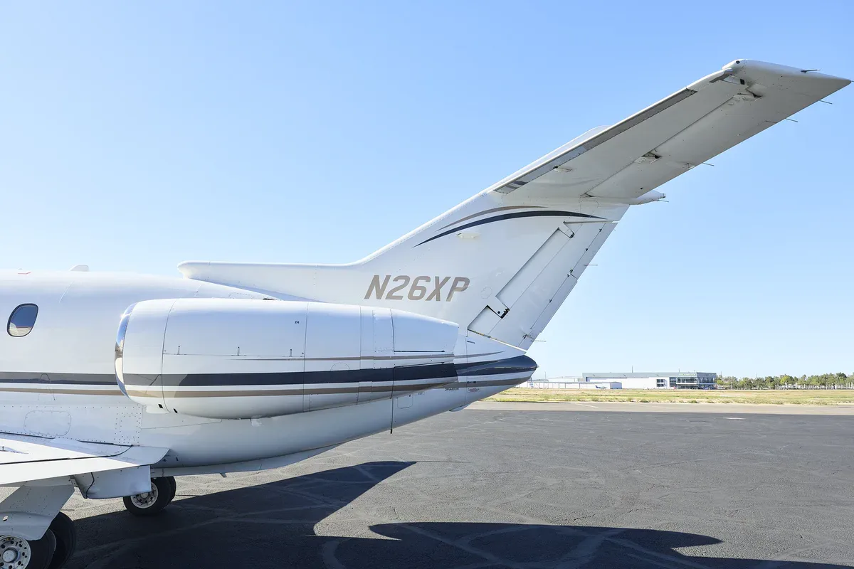 Exterior view of a 2010 Hawker 900XP SN, N26XP.