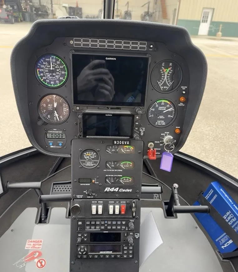 Cockpit and instrument panel of a 2025 ROBINSON R44 CADET.