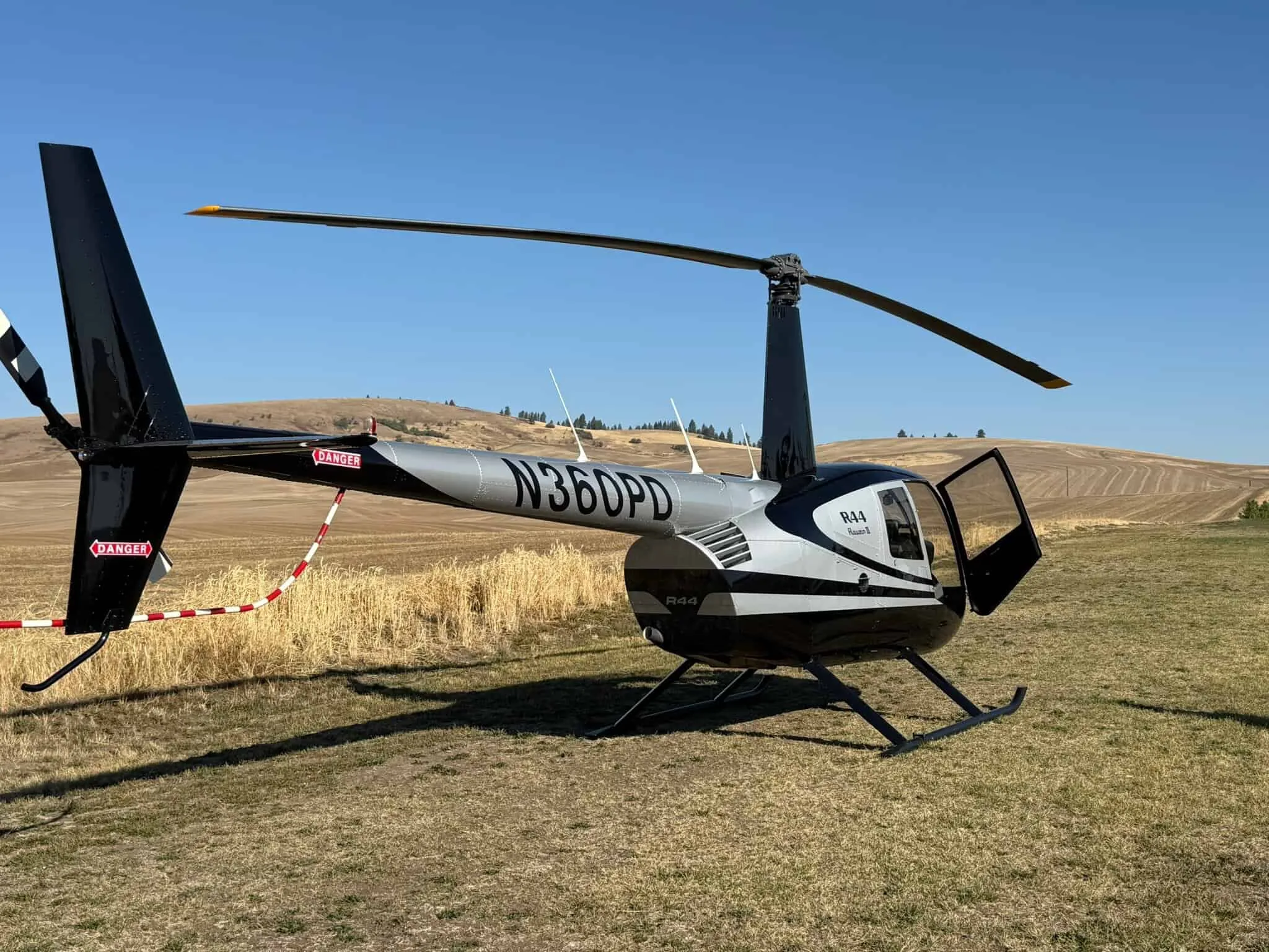 Exterior view of a 2010 Robinson R44 II.