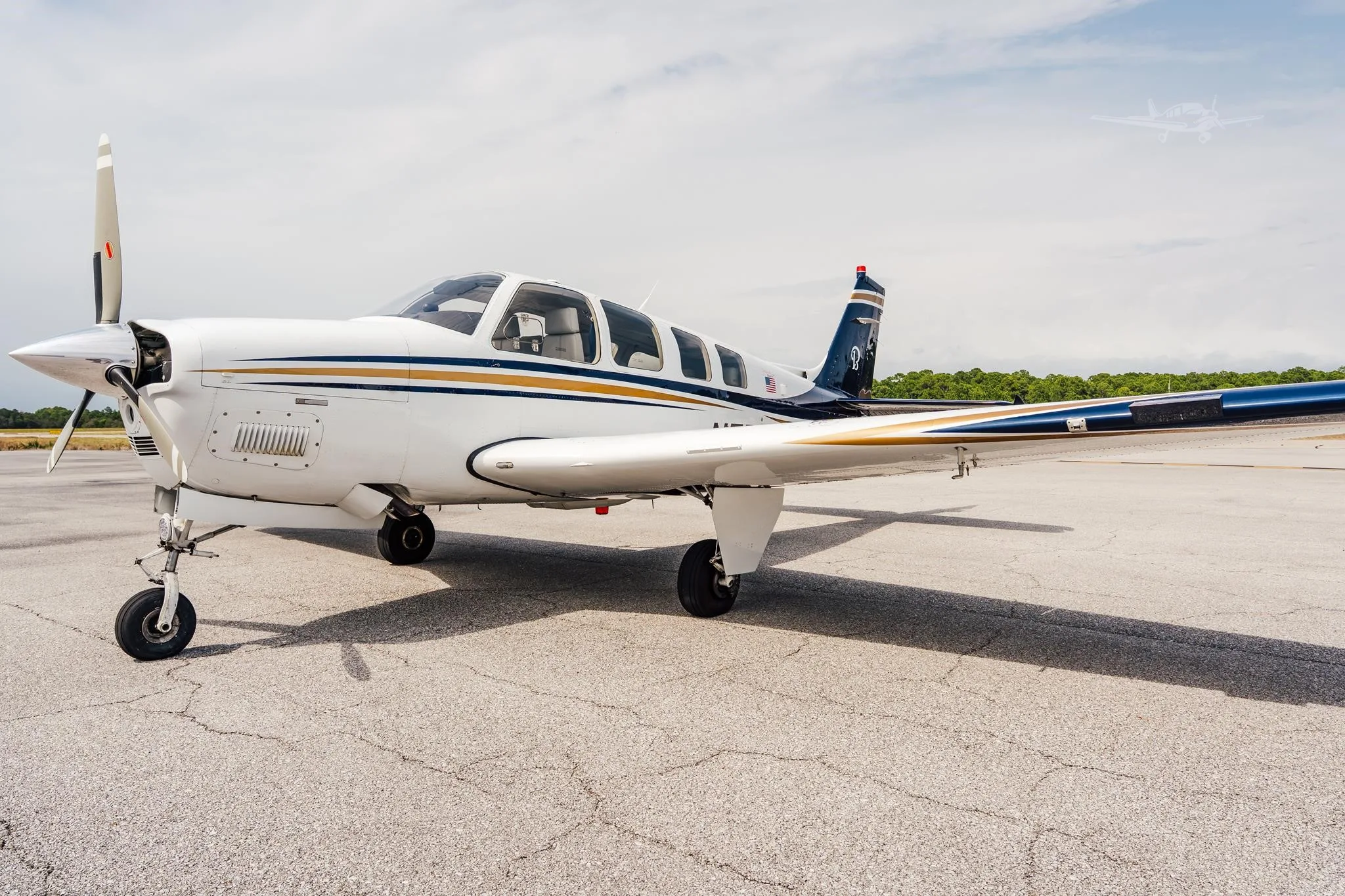 Exterior view of a 2006 BEECHCRAFT G36 BONANZA, N771CG.
