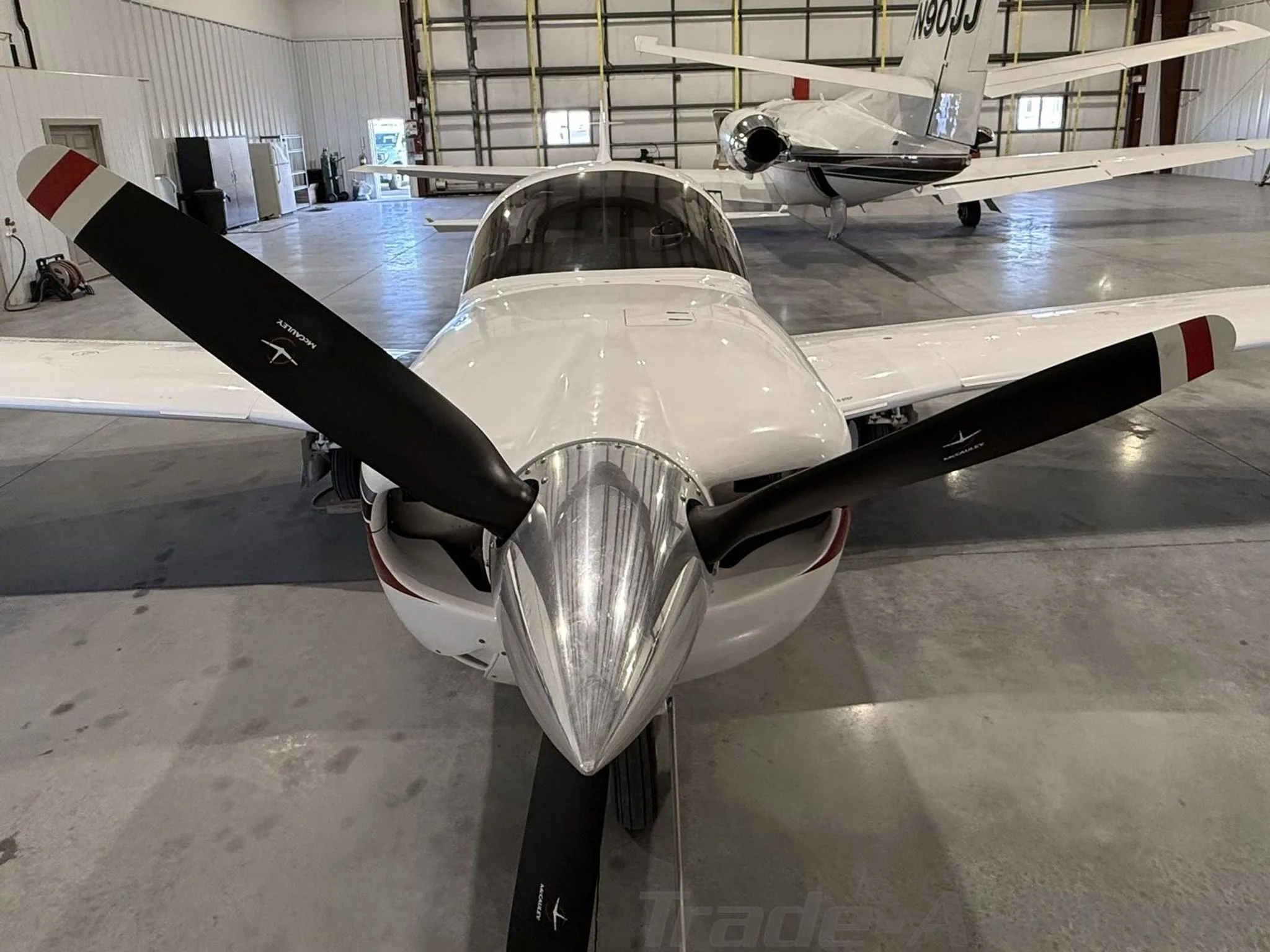 Exterior view of a 2005 MOONEY M20M GX BRAVO, N66YC.