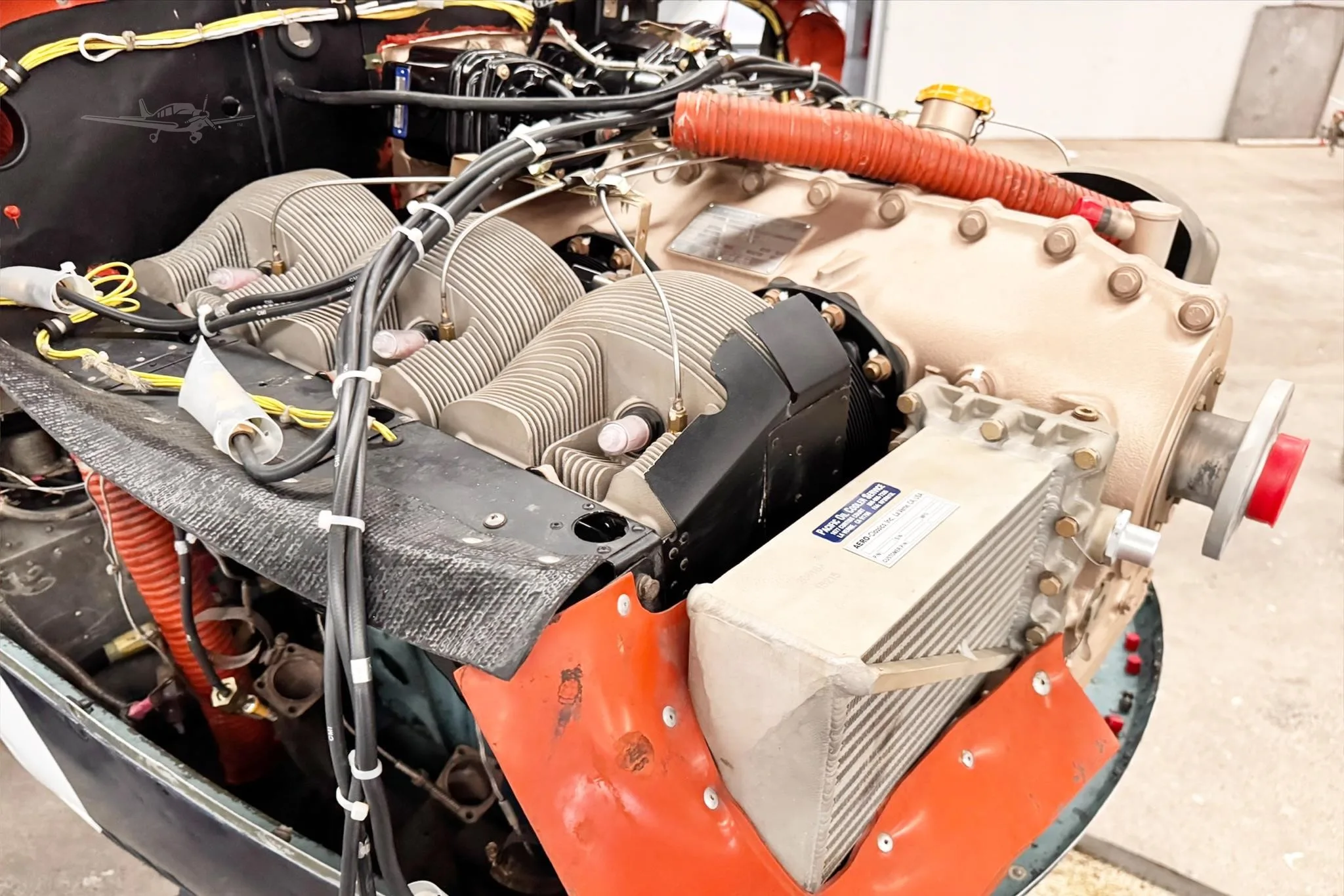 Engine detail of a 1964 CESSNA U206 SUPER SKYWAGON.