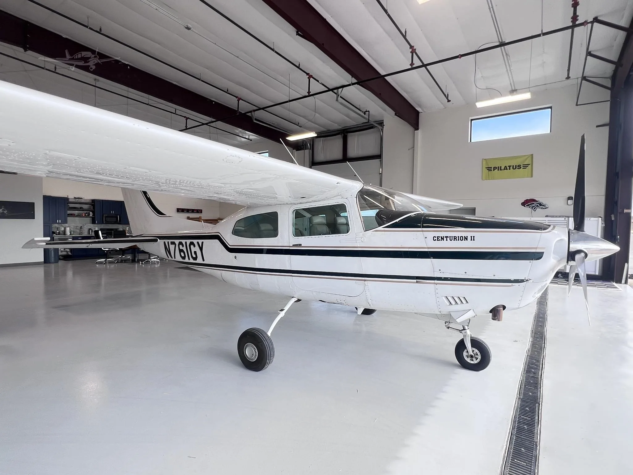 Exterior view of a 1977 CESSNA TURBO 210M, N761GY.