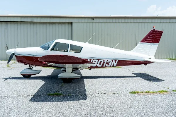 Exterior view of a 1968 Piper Cherokee 140, N8013N.