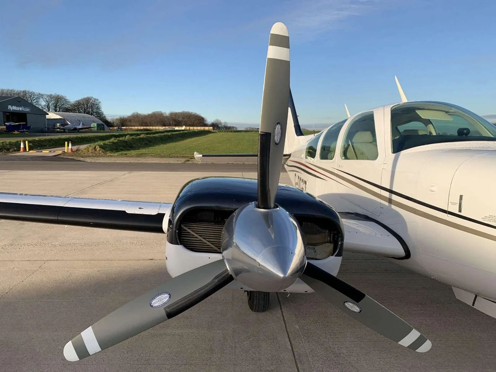 Exterior view of a 1976 Beechcraft Baron B55, G-DGST.