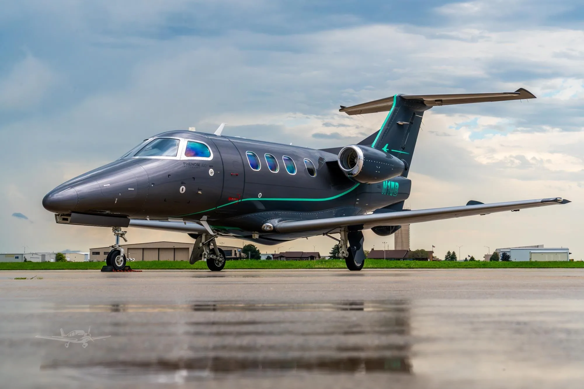 Exterior view of a 2010 EMBRAER PHENOM 100EV, N1WB.