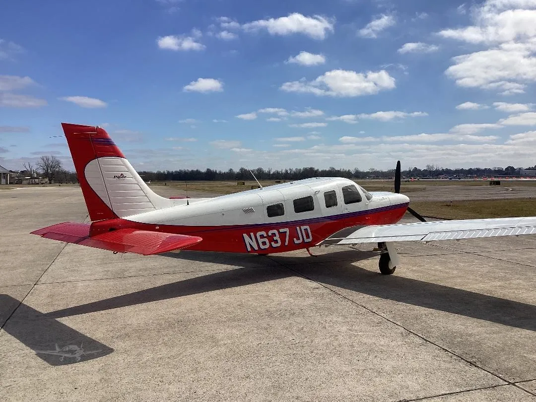 Exterior view of a 2003 PIPER SARATOGA II HP, N637JD.