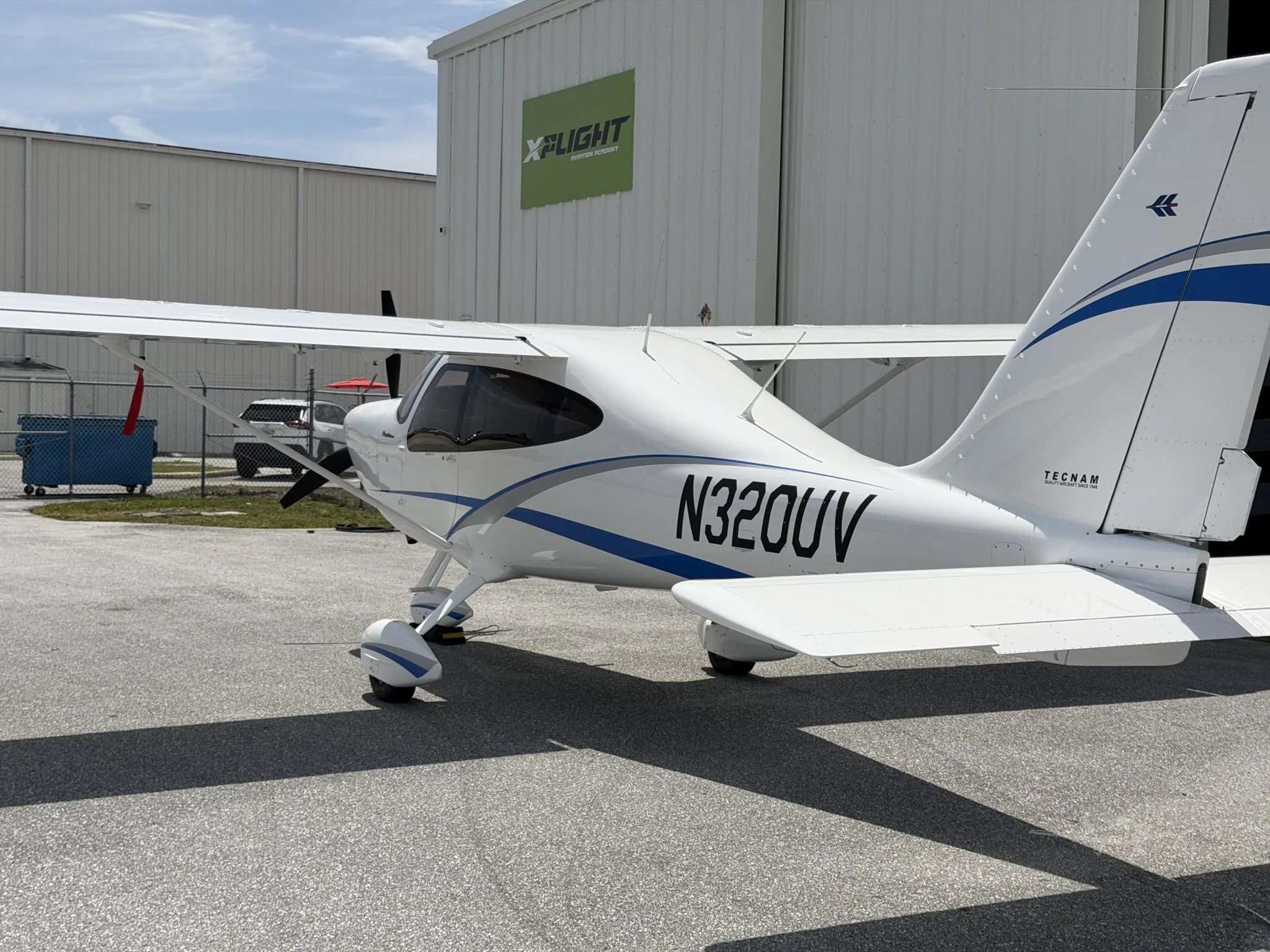 Exterior view of a 2025 TECNAM P2010 MKII, N320UV.
