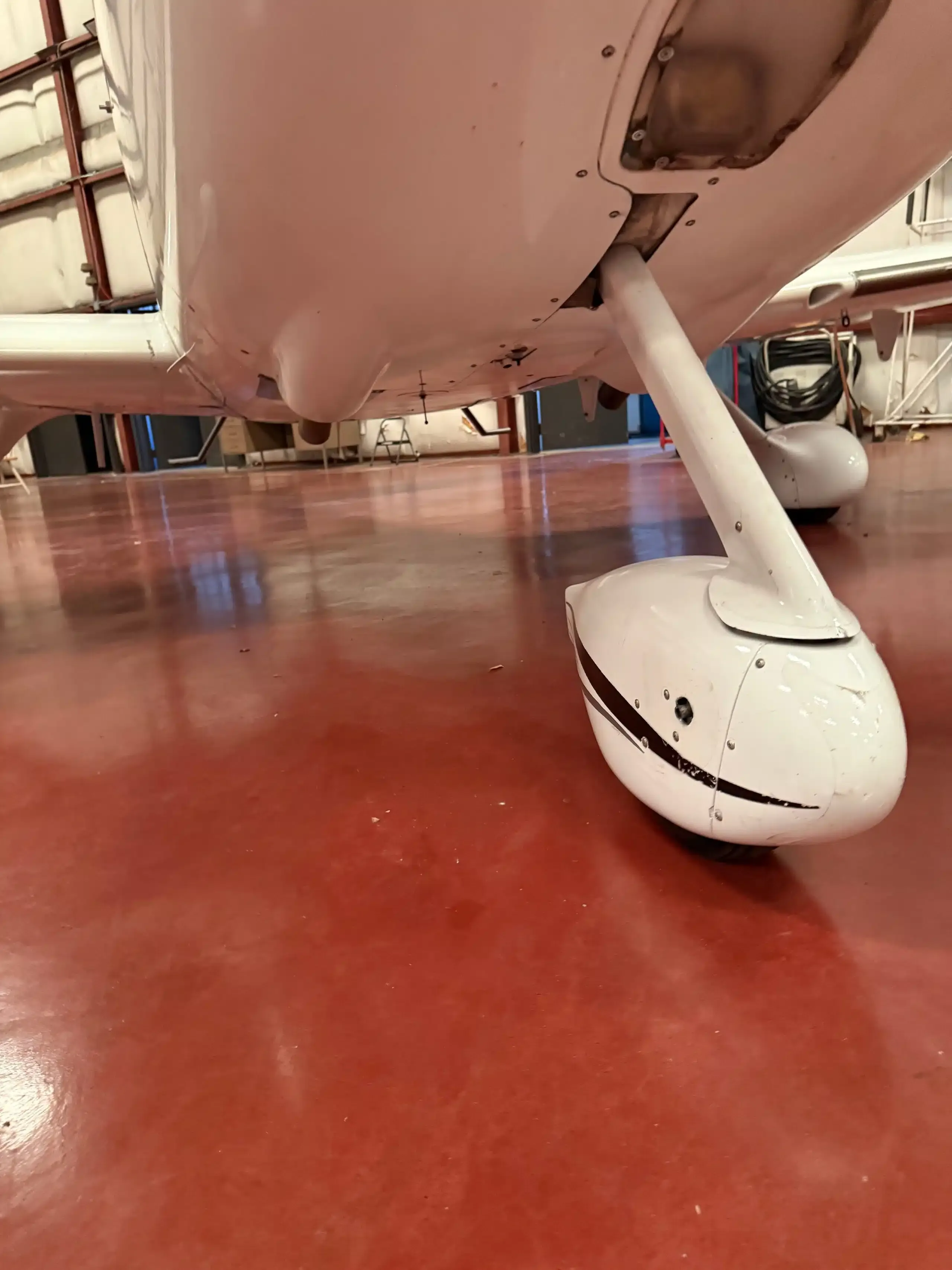 Exterior view of a 2005 Cirrus SR22 GTS, N159HA.