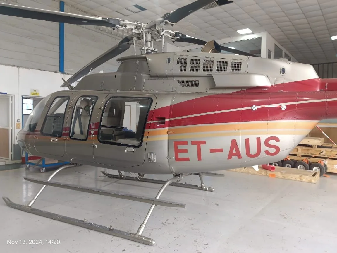 Exterior view of a 2009 Bell 407, ET-AUS.