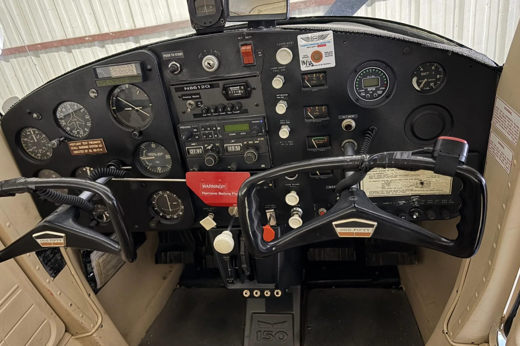 Cockpit and instrument panel of a 1965 CESSNA 150.