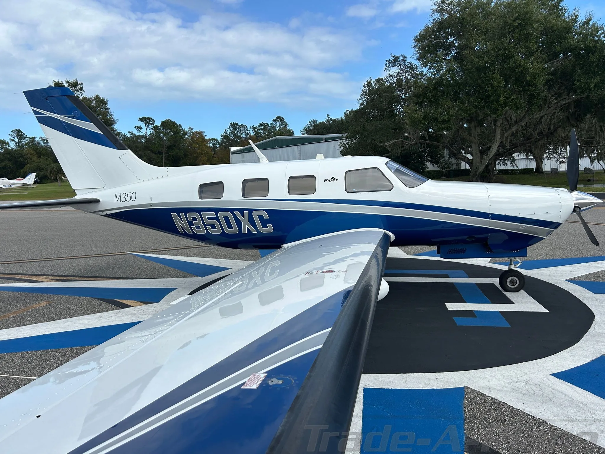 Exterior view of a 2017 PIPER M350, N350XC.