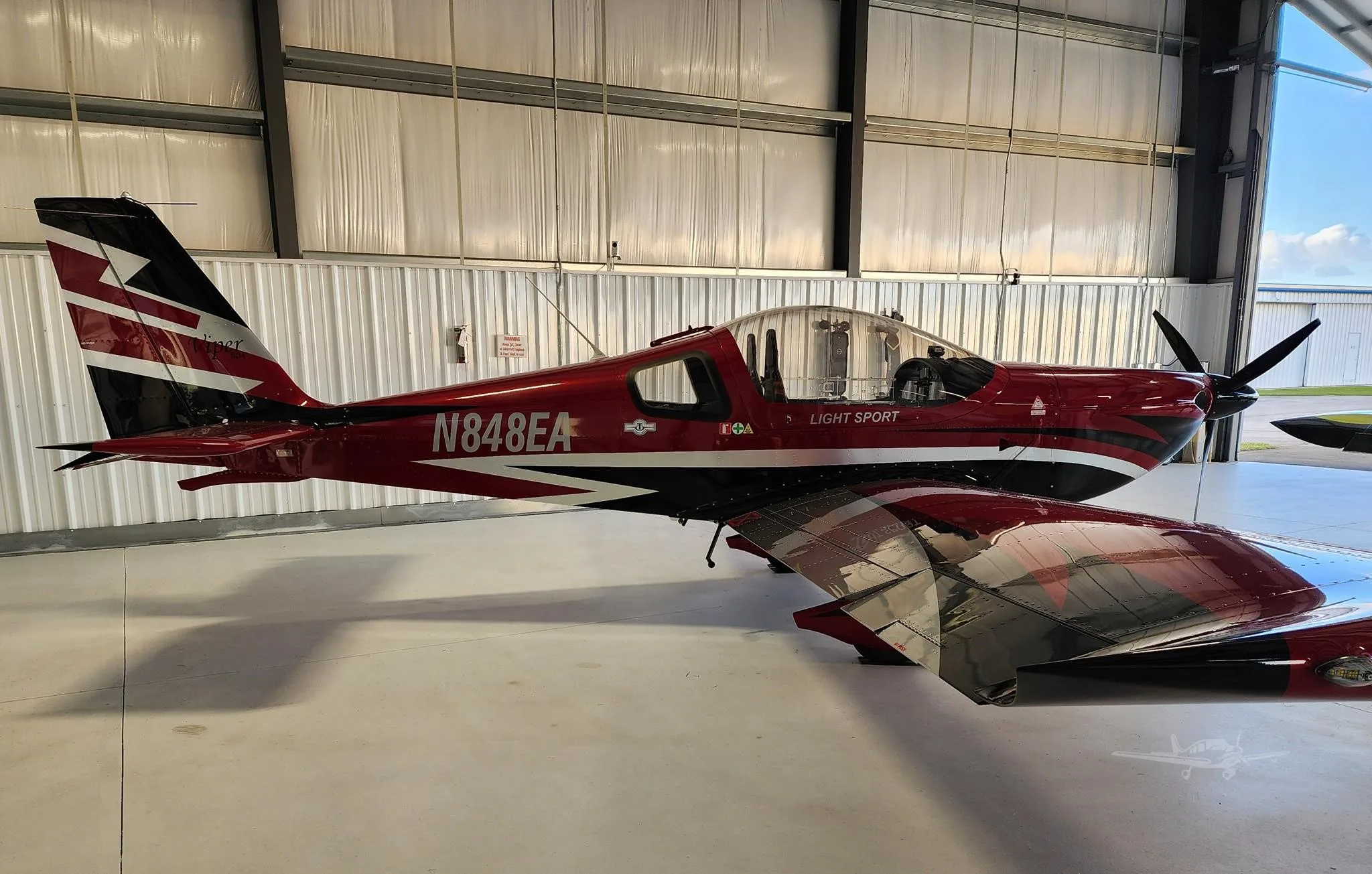 Exterior view of a 2025 TOMARK AERO VIPER SD4, N848EA.