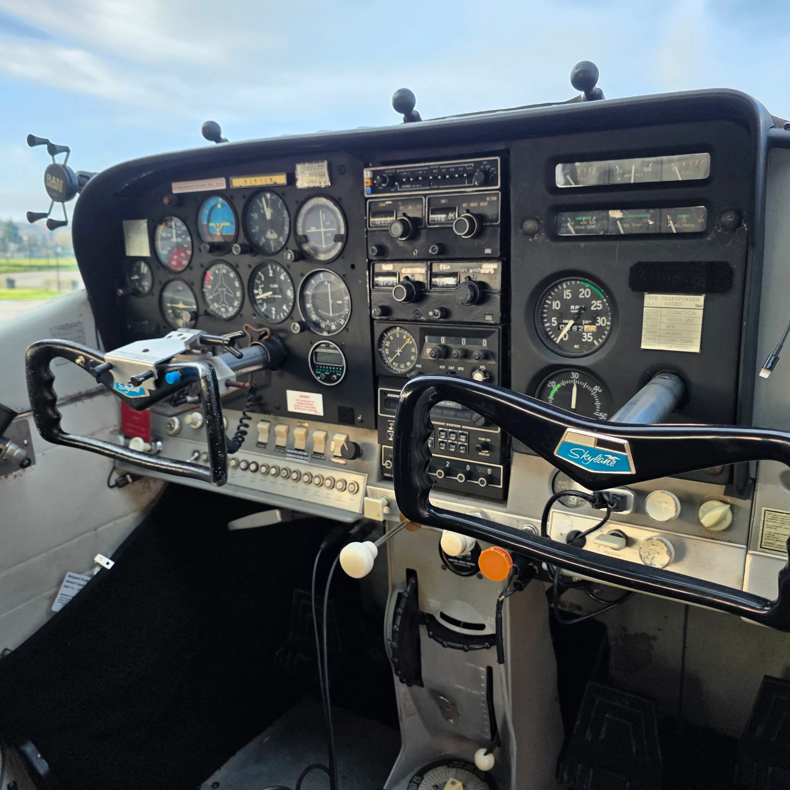 Cockpit and instrument panel of a 1968 Piper 182H.